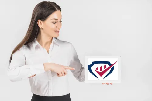 "Professional businesswoman in white shirt pointing at Labor Day logo on digital tablet against white background"